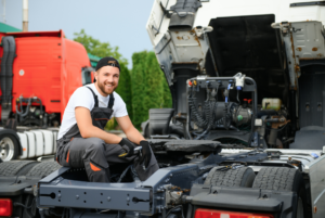 An on-site truck repair being overseen by a mechanic